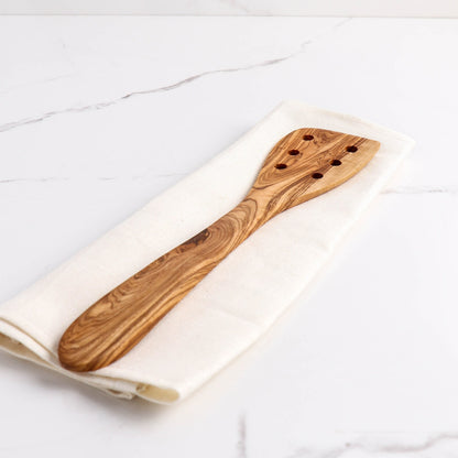 Olive wood spatula with holes 